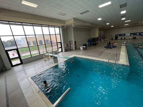 The diving board in the large pool.